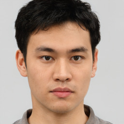 Neutral asian young-adult male with short  brown hair and brown eyes