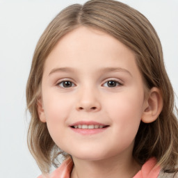 Joyful white child female with medium  brown hair and grey eyes