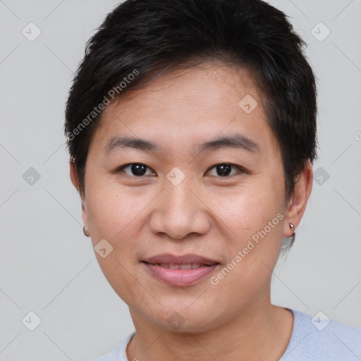 Joyful asian young-adult female with short  brown hair and brown eyes