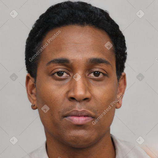 Neutral black young-adult male with short  black hair and brown eyes
