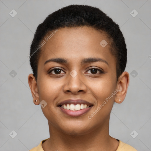 Joyful black young-adult female with short  brown hair and brown eyes