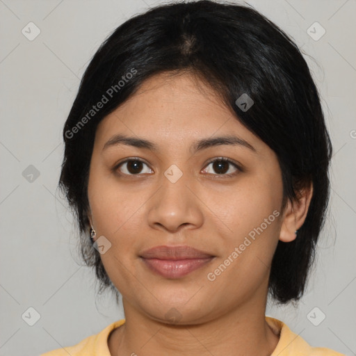 Joyful latino young-adult female with medium  black hair and brown eyes