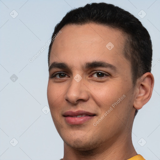 Joyful white young-adult male with short  black hair and brown eyes