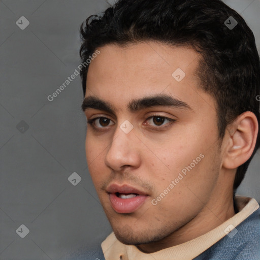 Neutral white young-adult male with short  black hair and brown eyes