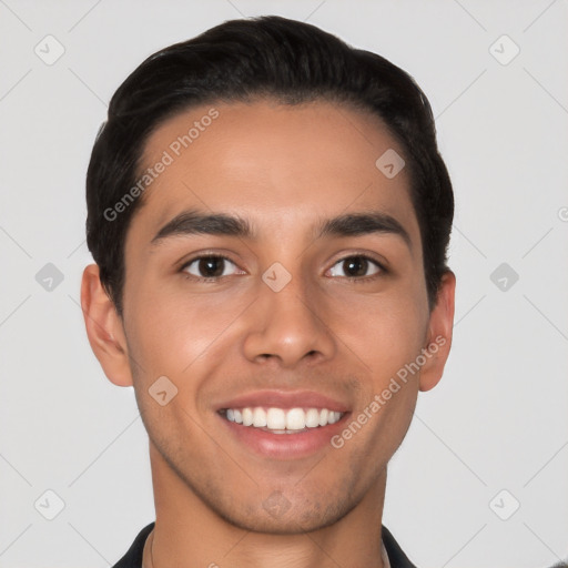 Joyful white young-adult male with short  black hair and brown eyes