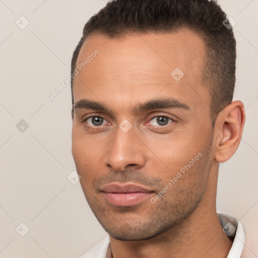 Neutral white young-adult male with short  brown hair and brown eyes