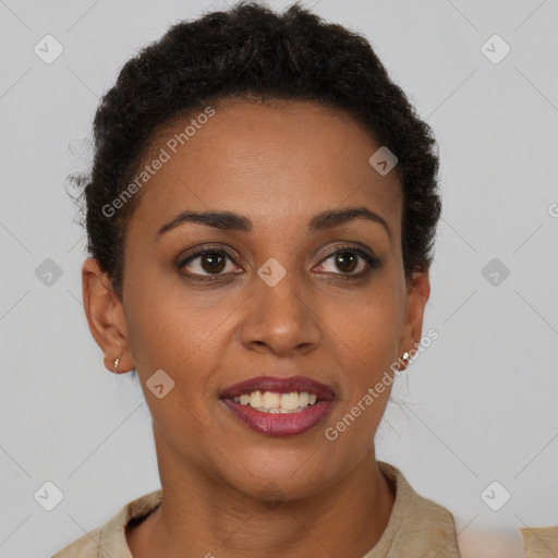 Joyful black young-adult female with short  brown hair and brown eyes