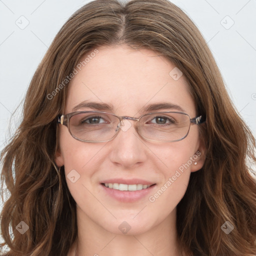 Joyful white young-adult female with long  brown hair and blue eyes