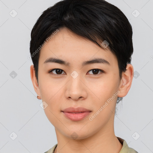 Joyful asian young-adult female with medium  black hair and brown eyes