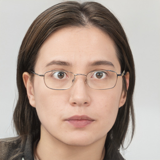 Neutral white young-adult female with long  brown hair and grey eyes