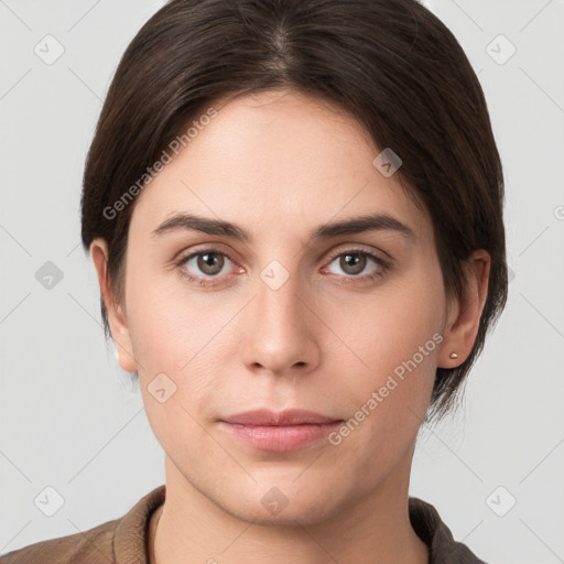 Neutral white young-adult female with short  brown hair and brown eyes