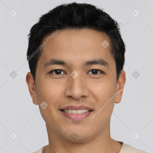 Joyful asian young-adult male with short  black hair and brown eyes