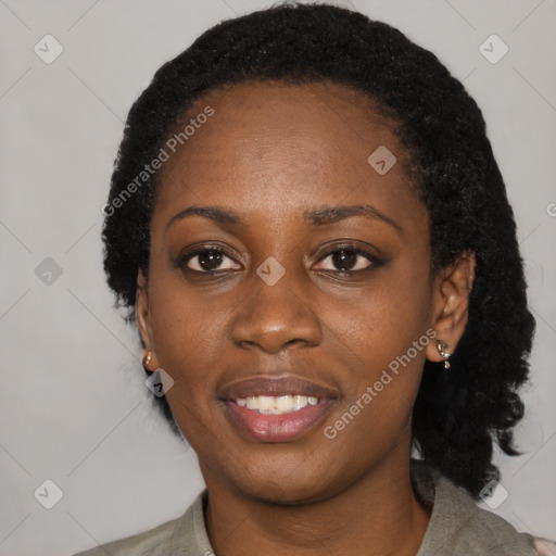 Joyful black young-adult female with medium  black hair and brown eyes