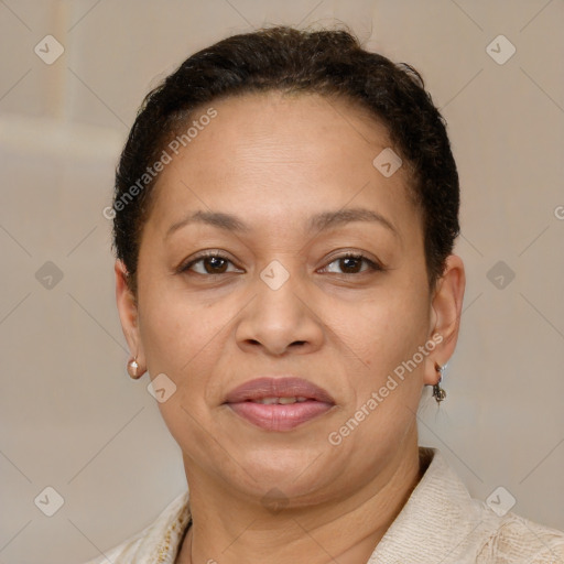 Joyful latino adult female with short  brown hair and brown eyes