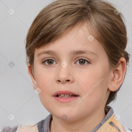 Joyful white child female with short  brown hair and grey eyes