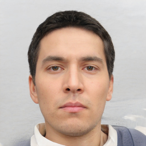 Neutral white young-adult male with short  black hair and brown eyes