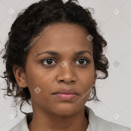 Neutral black young-adult female with medium  brown hair and brown eyes