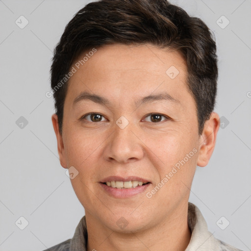 Joyful white adult male with short  brown hair and grey eyes