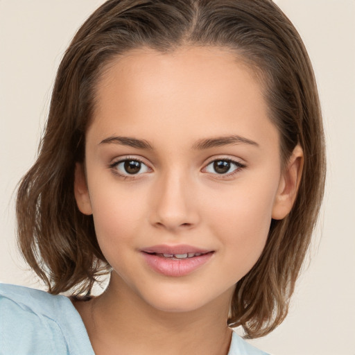 Joyful white child female with medium  brown hair and brown eyes