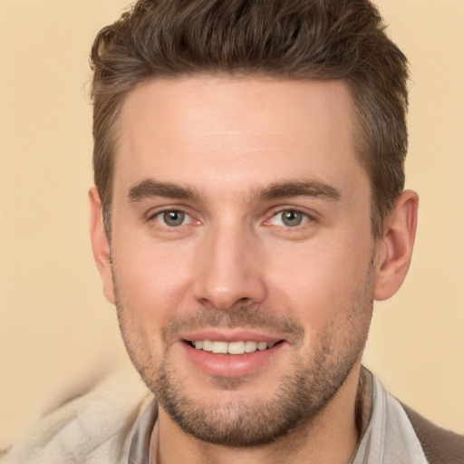 Joyful white young-adult male with short  brown hair and brown eyes