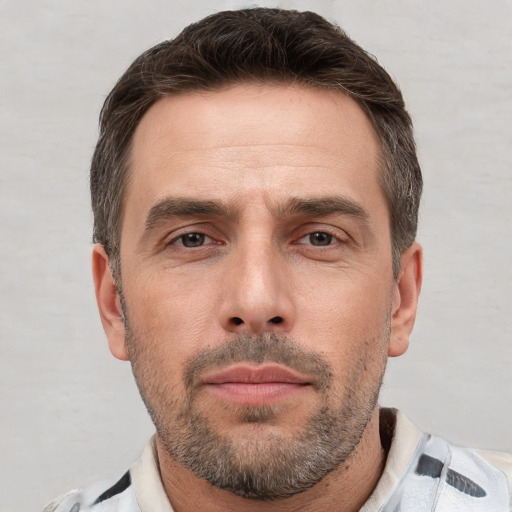 Neutral white adult male with short  brown hair and brown eyes