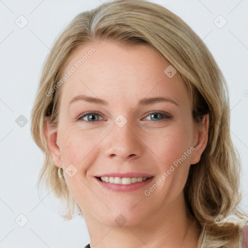 Joyful white young-adult female with medium  brown hair and blue eyes