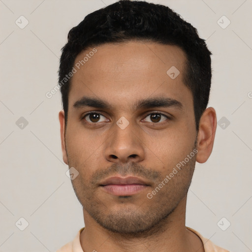 Neutral latino young-adult male with short  black hair and brown eyes