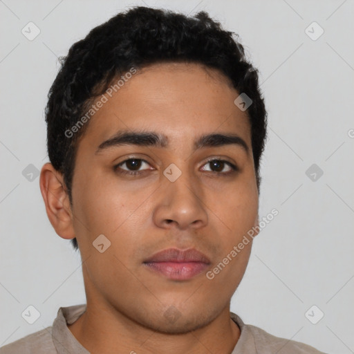 Neutral latino young-adult male with short  brown hair and brown eyes