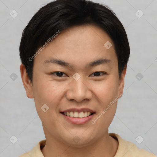 Joyful asian young-adult female with short  brown hair and brown eyes