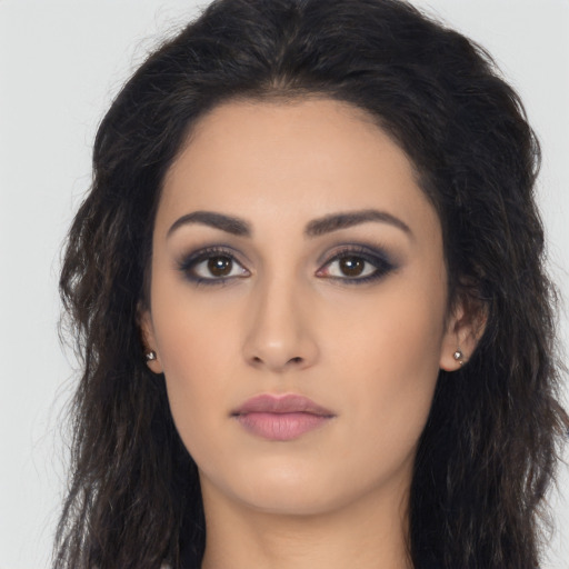 Neutral latino young-adult female with long  brown hair and brown eyes