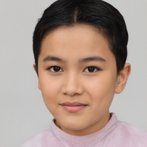 Joyful asian child female with short  brown hair and brown eyes