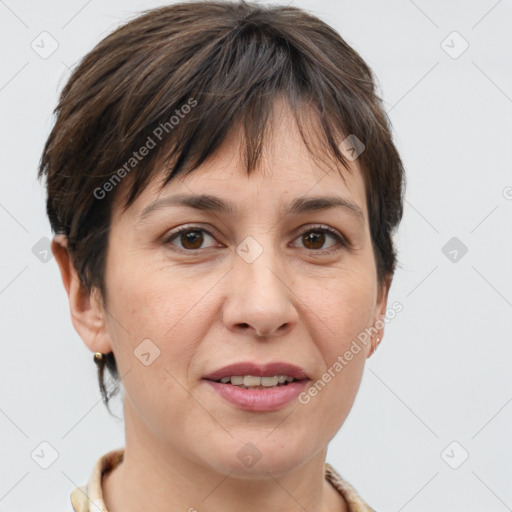 Joyful white adult female with short  brown hair and grey eyes