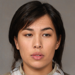 Neutral asian young-adult female with medium  brown hair and brown eyes