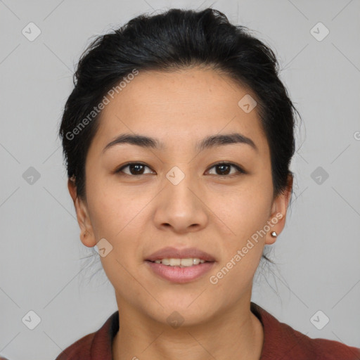 Joyful latino young-adult female with medium  brown hair and brown eyes