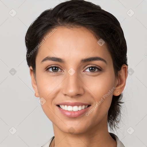 Joyful white young-adult female with medium  brown hair and brown eyes