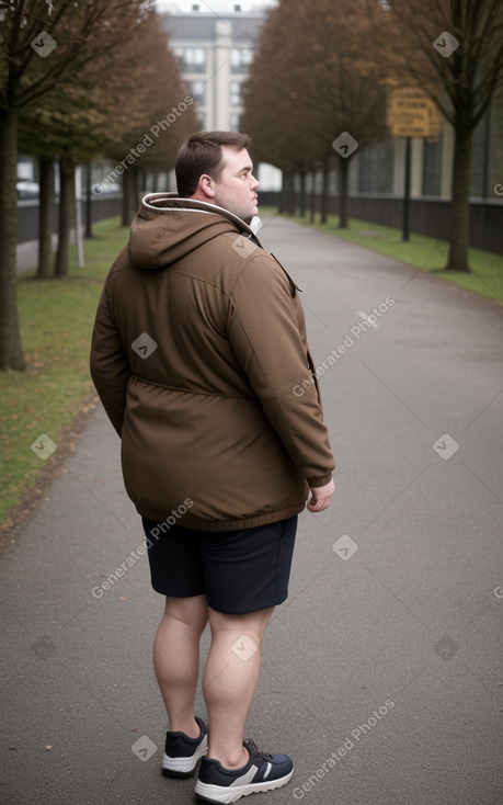 British adult male with  brown hair