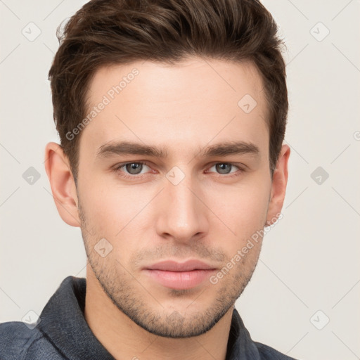 Neutral white young-adult male with short  brown hair and grey eyes