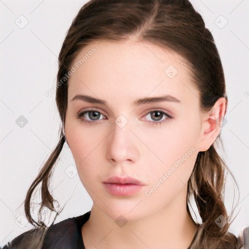 Neutral white young-adult female with long  brown hair and brown eyes