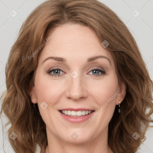 Joyful white young-adult female with medium  brown hair and green eyes