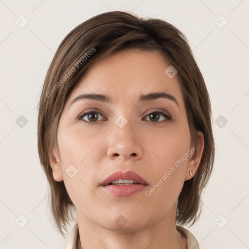 Neutral white young-adult female with medium  brown hair and brown eyes