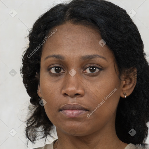 Neutral black young-adult female with medium  brown hair and brown eyes