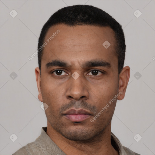 Neutral latino young-adult male with short  black hair and brown eyes