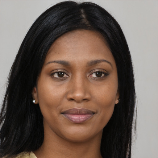 Joyful asian young-adult female with long  black hair and brown eyes