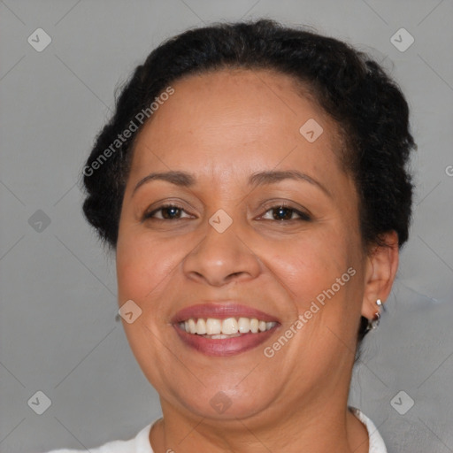 Joyful black adult female with short  brown hair and brown eyes