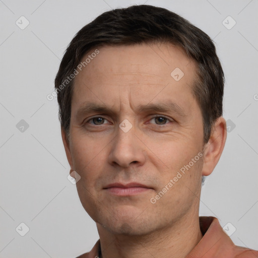 Neutral white adult male with short  brown hair and brown eyes