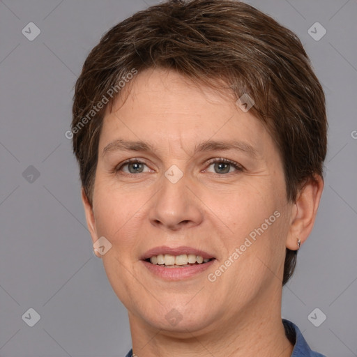 Joyful white adult female with short  brown hair and brown eyes