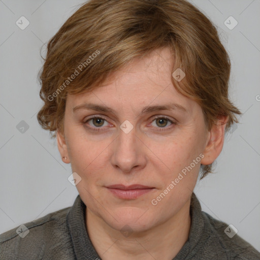 Joyful white adult female with medium  brown hair and blue eyes