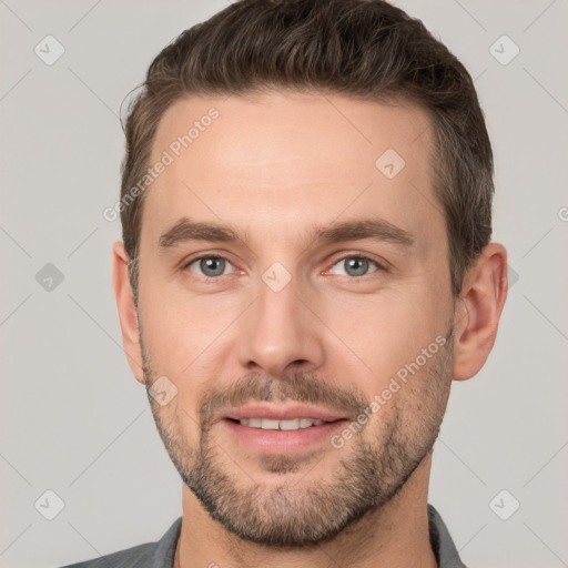 Joyful white young-adult male with short  brown hair and brown eyes