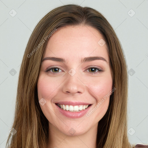 Joyful white young-adult female with long  brown hair and green eyes