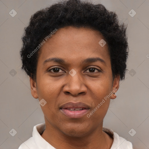 Joyful black adult female with short  brown hair and brown eyes